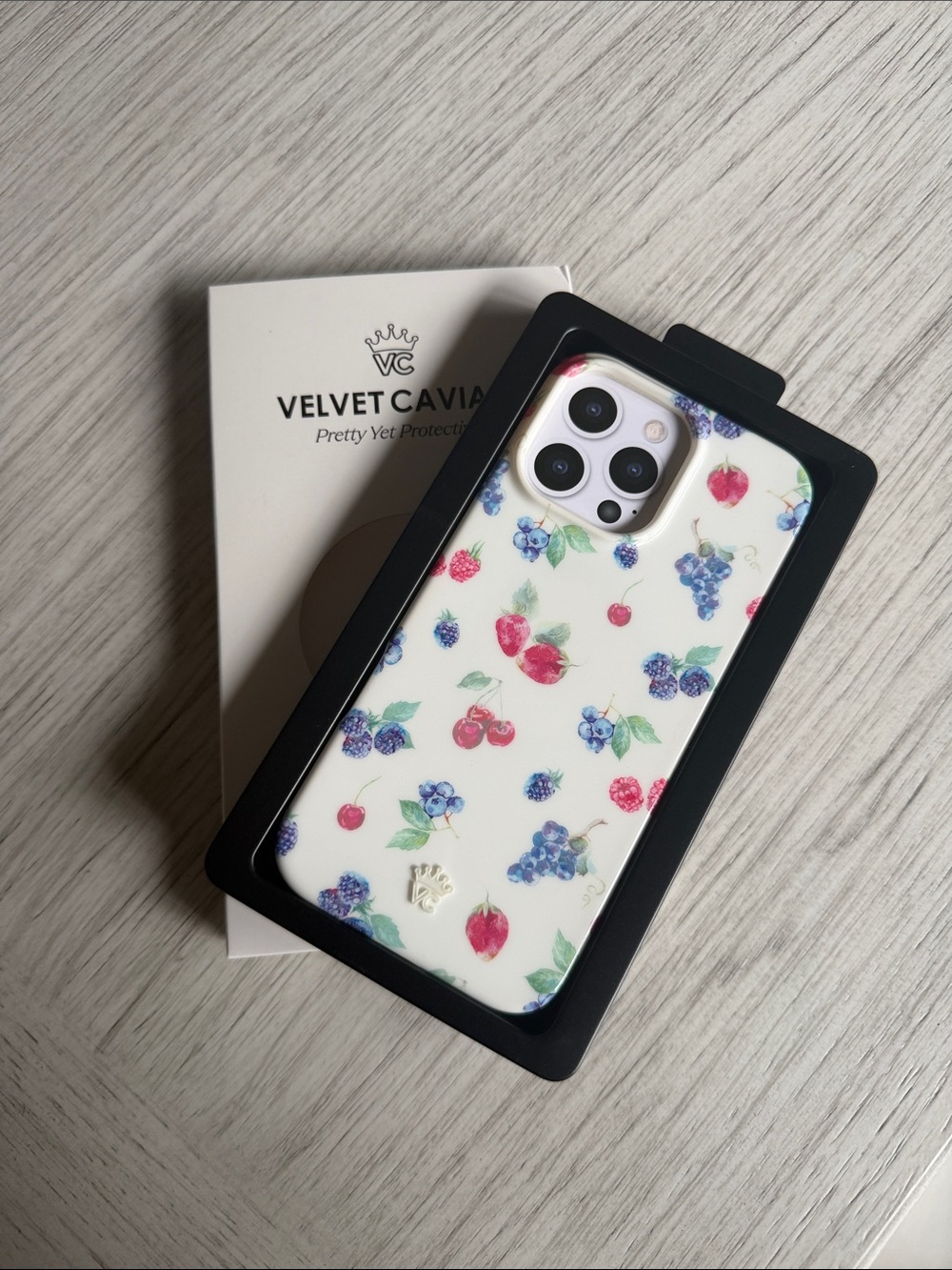Velvet Caviar White Floral Fruit iPhone 16 Pro Max Case with Red & Blue Accents